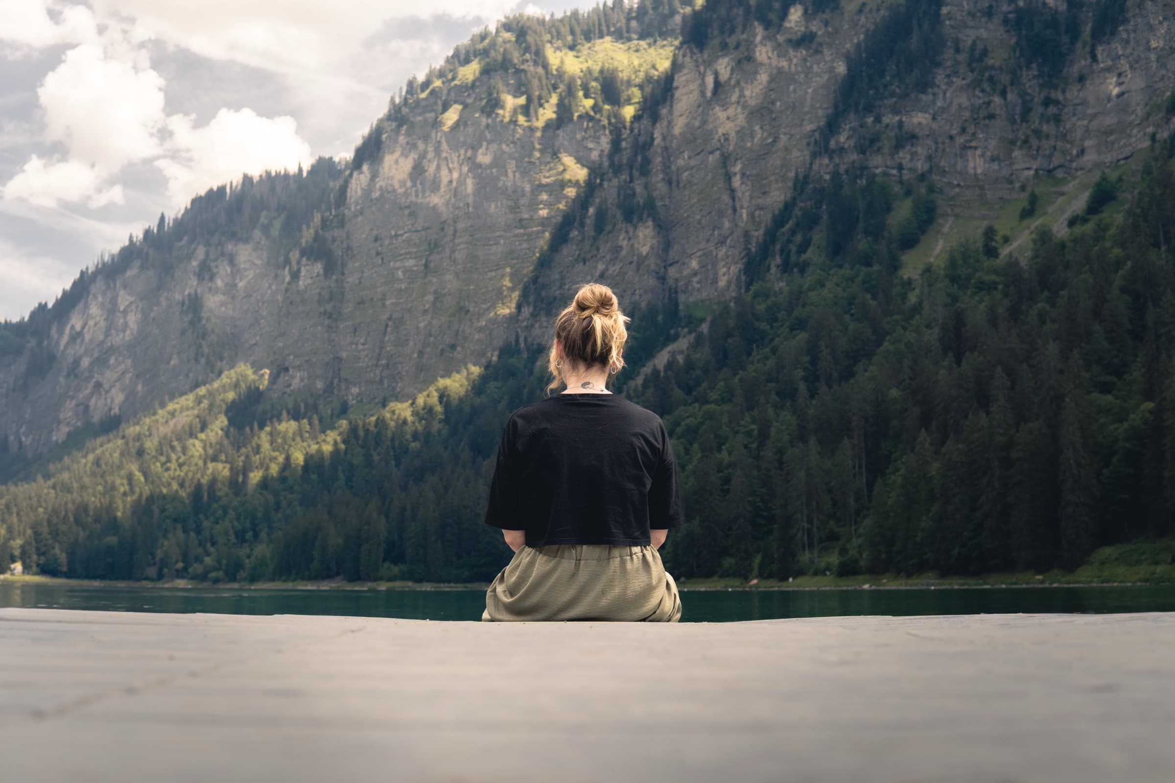 Abi looking out across Lac de Montriond and the mountains of the Portes du Soleil